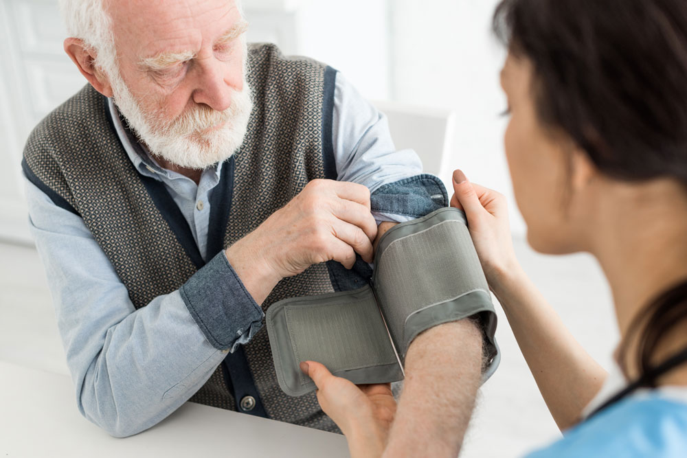 checking blood pressure