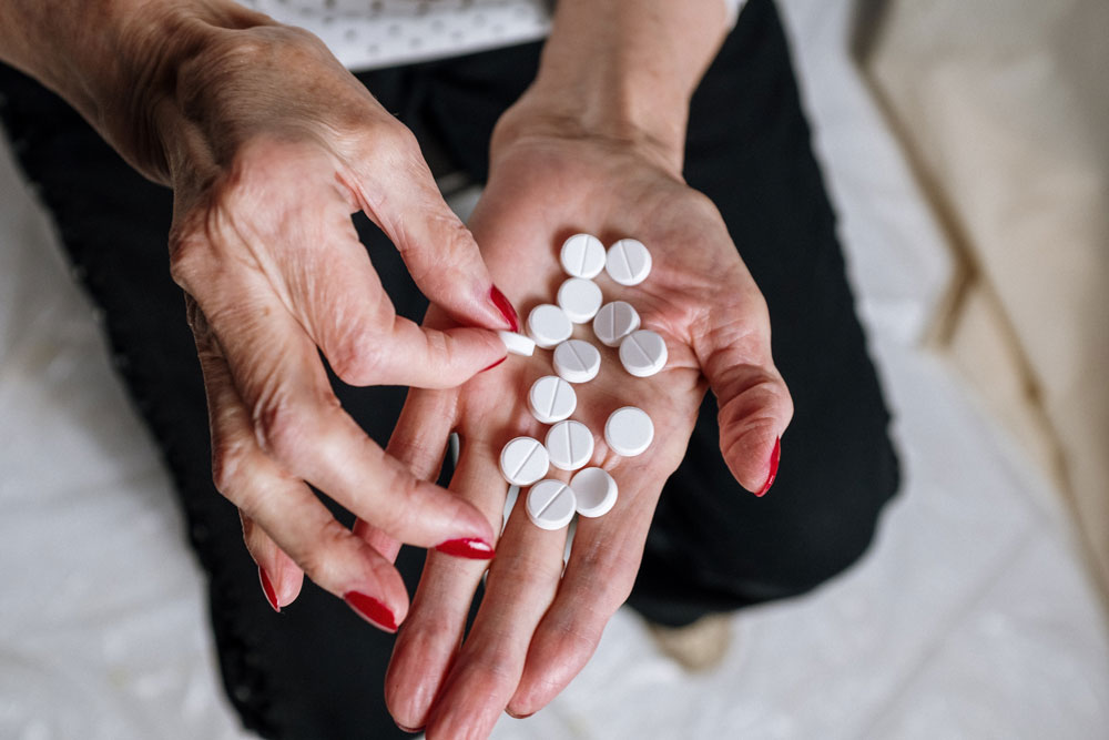 woman taking meds